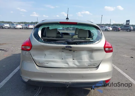 2016 Ford Focus Titanium z USA, uszkodzony, nr VIN 1FADP3N22GL205374